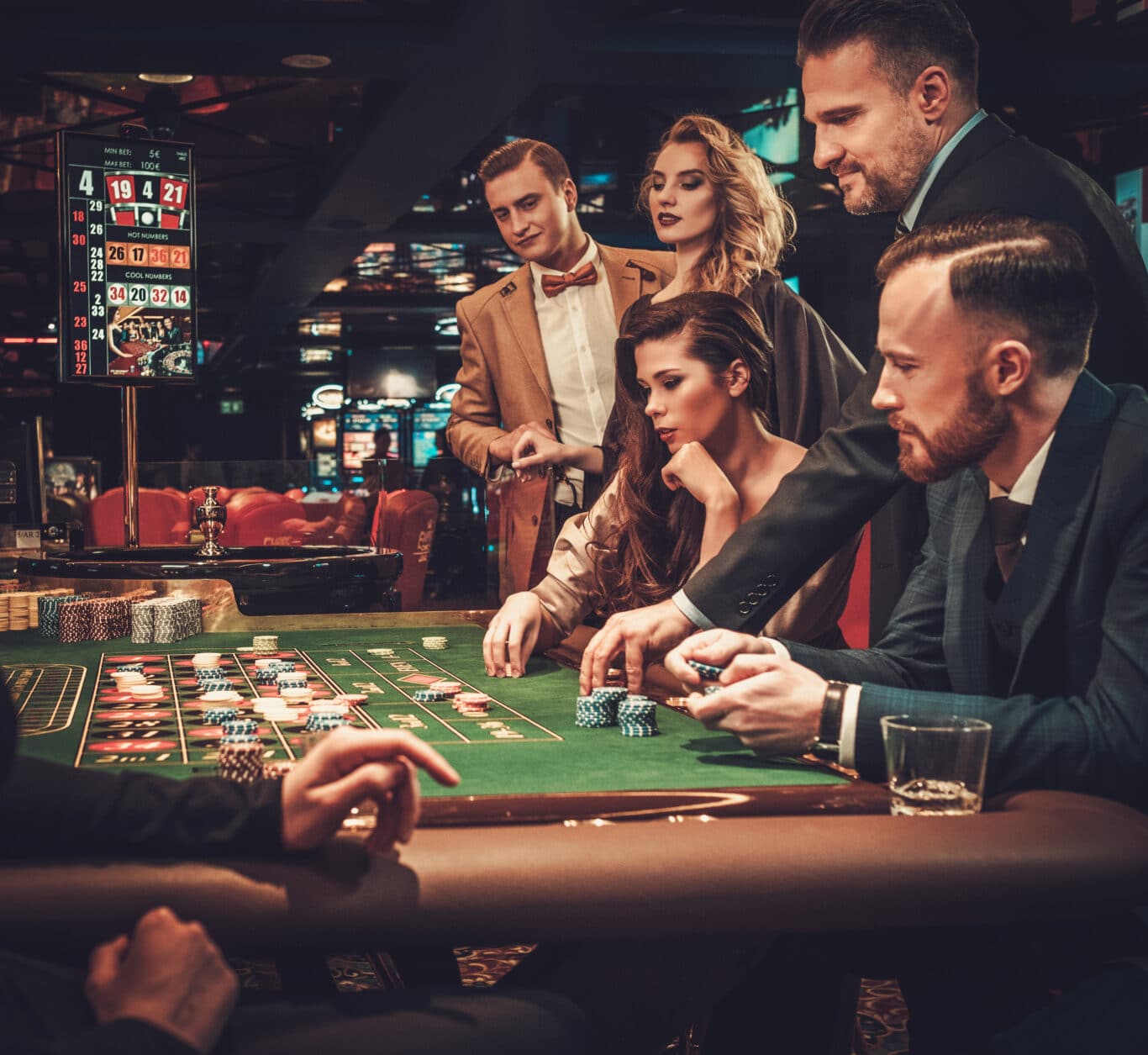 upper class friends gambling in a casino 2021 08 26 16 21 17 utc